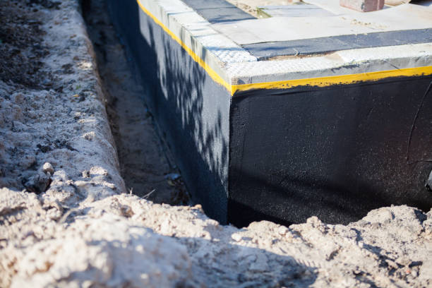 Professional Emergency Waterproofing technician working in Riverside, OH